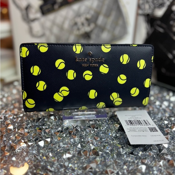 kate spade Handbags - Kate Spade New York Tennis Toss Large Slim Bifold Wallet NWT